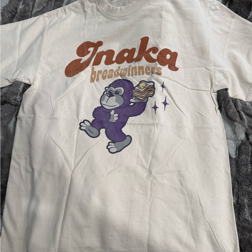 NAK Cream and Purple Retro Graphic Tee